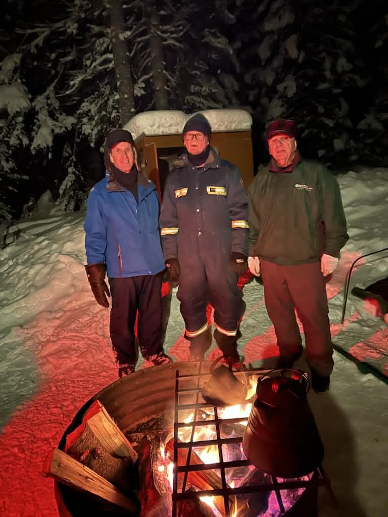 Firepit gathering at Winter Carnival