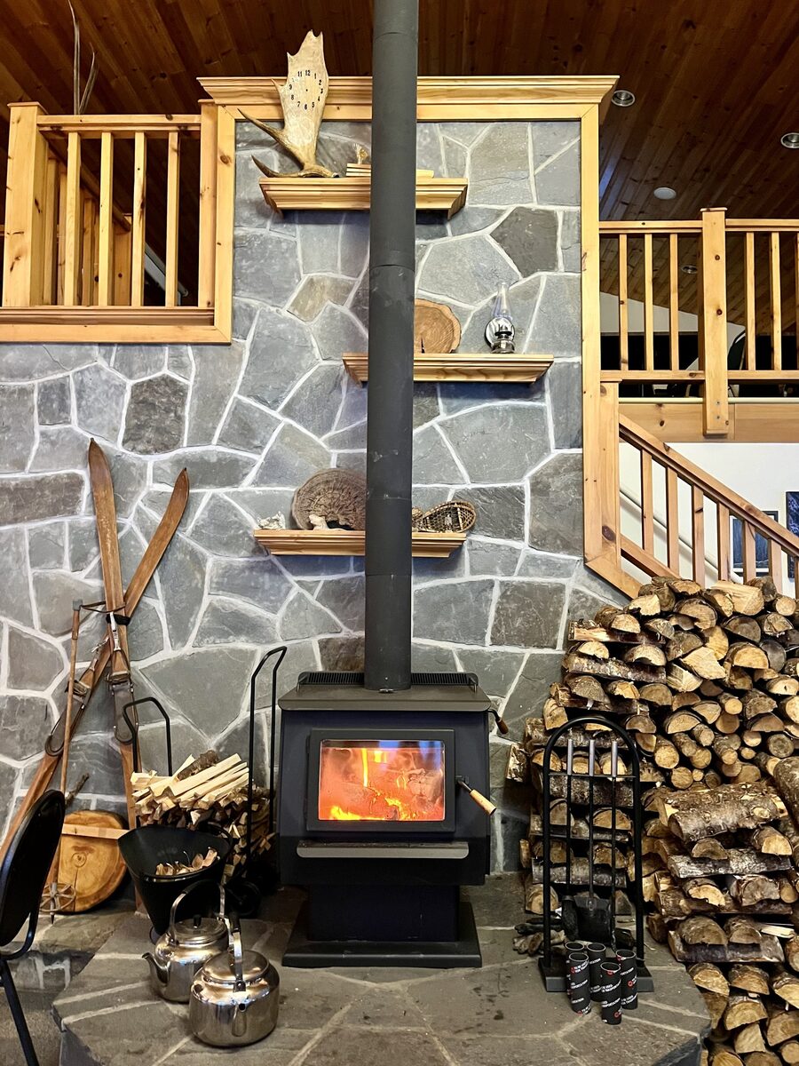 Wood stove fireplace inside the chalet